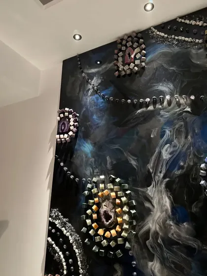 Another angle of the large astrology-themed conceptual art wall. The piece weighs over 200 kgs and is a testament to the scale and ambition possible with resin art.