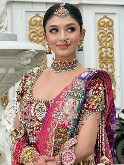 This is the level of artistry I teach. Notice the flawless skin finish, the sharp winged eyeliner, and the perfectly blended eyeshadow that complements the intricate jewellery. In my classes, you will learn how to create these iconic, modern Maharashtrian bridal looks that feel both royal and contemporary.