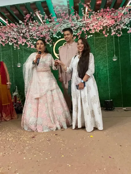 On stage with the bride, who is sharing a few words. I coordinate with the DJ and MC to ensure everything runs smoothly.