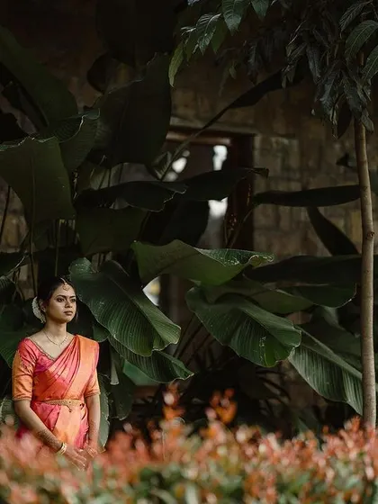 A duplicate of the serene garden portrait of the South Indian bride (ID 213).