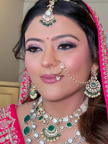 Another angle of the eye makeup, showing the precise blending and sharp winged liner.
