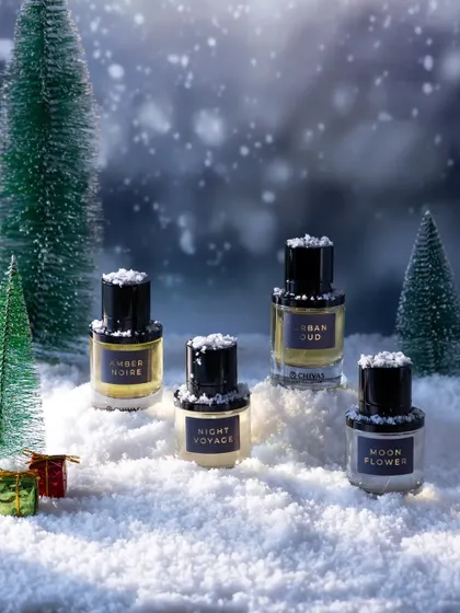We built a miniature winter wonderland for this Fraganote Christmas shoot. Using fake snow, miniature trees, and carefully controlled lighting, we created a magical, snowy scene to showcase the perfume collection.