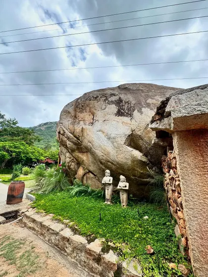 The natural rock formations and stone statues are an integral part of our resort's landscape design.