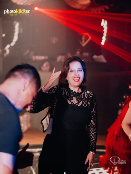 A guest having a great time on the dance floor. We focus on capturing the genuine joy and energy of the people at the event.