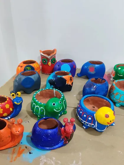 The finished animal planters look so bright and cheerful! These make for a wonderful and useful take-home gift.
