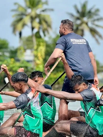 Close-up during a training run, observing the athletes' form. I focus on individual biomechanics within the team structure to ensure each athlete is contributing effectively and safely.