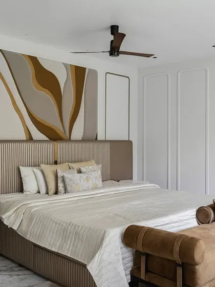 This is not a typical kids' room. We designed this bedroom in our Chennai project to evolve with age, using a sophisticated palette of neutrals, curved furniture, and an abstract art piece above the bed. It's a nod to maturity without losing the magic.