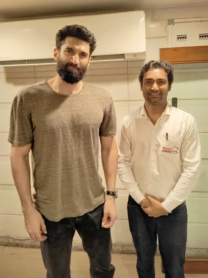Aditya Roy Kapoor posing with our staff. He is a regular and we are always happy to see him.
