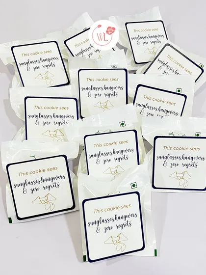 "This cookie sees sunglasses, hangovers & zero regrets." I love adding humor with custom-labeled treats like these, perfect for a groomsman survival kit.