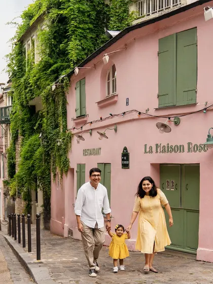 Bonjour from Paris! Capturing this family's joy as they stroll past the iconic La Maison Rose was a dream. It shows that I'm ready to travel to capture your family's adventures wherever they may be.