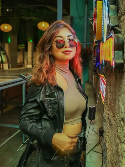 Another look from my photoshoot with the neon signs. The vibrant colors and edgy vibe perfectly match my personality.