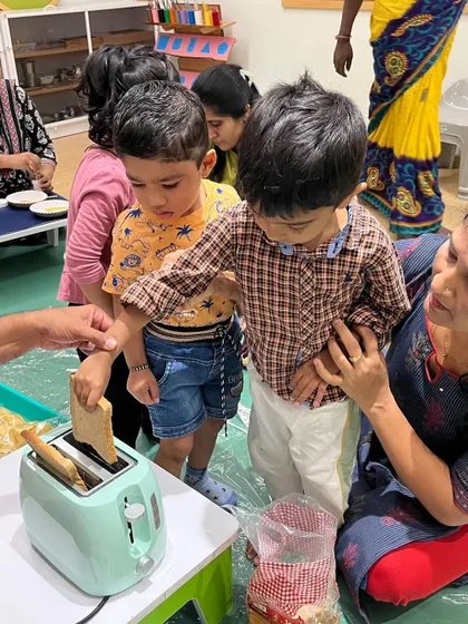 Each activity, from making Bhel Puri and toast to plucking methi leaves and exploring what floats, is a lesson in itself. These practical life and sensorial activities are central to the Montessori method, helping children develop fine motor skills, concentration, and a deep understanding of the world through their own actions.