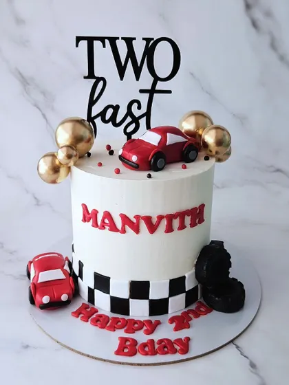 Vrooooom! A "Two Fast" car-themed cake for Manvith's 2nd birthday. This vanilla cake is simple, fun, and perfect for a little car lover.