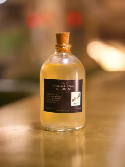 Our Chamomile & Sage Negroni, a clear, delicate version created for Negroni Week. This bottled cocktail showcases our innovative take on the classic, using infusions to create a lighter, more herbaceous profile.