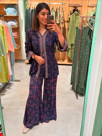 Another look at the navy and pink co-ord set, showing the intricate details. This is a perfect outfit for a festive gathering where you want to be comfortable yet stylish.