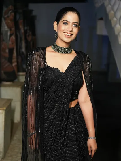 Another look at my attire for the Encalm annual event. My style is always chosen to complement the client's brand and the event's atmosphere.