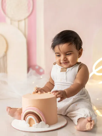 A different angle of this little one enjoying his rainbow cake. The pure happiness is wonderful to see.