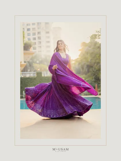 The Mehendi ceremony is a celebration of color, art, and joyful anticipation. I love capturing the bride in her element, like in this moment of pure happiness. The twirl of the lehenga, the golden sunlight, and her radiant smile all come together to create a frame that is full of life and energy.