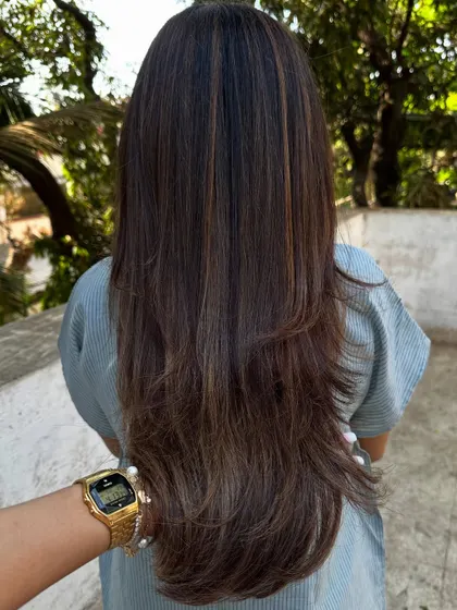 The back view of the 'Beige + Chocolate' look.