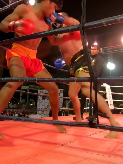 More action from the championship fight. Our fighter presses the action, landing a clean punch on his opponent.