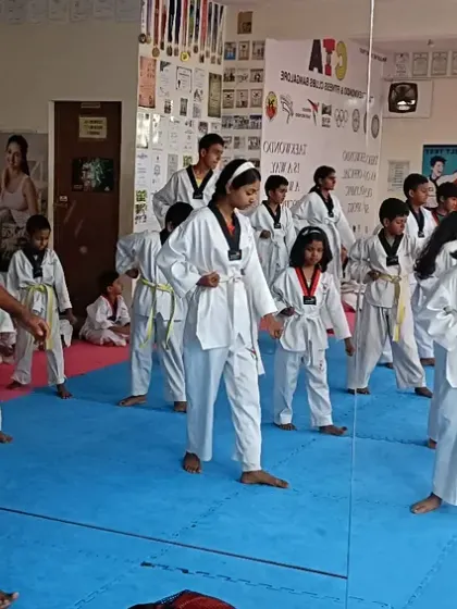 I walk through the class, observing and correcting my students' forms.