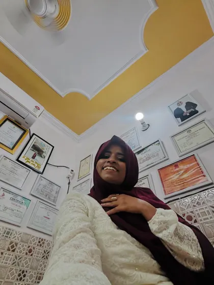 Another view of me in my studio, with my wall of fame. These certificates from various competitions and courses motivate me to keep learning and teaching.