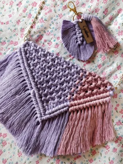 Stylishly carry your essentials with this dual-toned macrame sling bag in purple and pink. It even comes with a matching personalized leaf keychain.