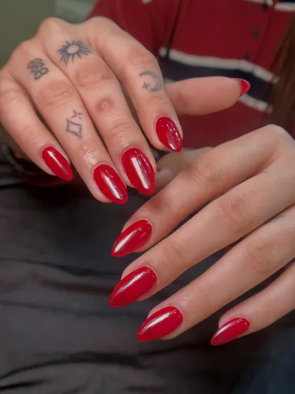 Another shot of this perfect, glossy red manicure. I pay close attention to shaping and cuticle work to ensure the final result is flawless and clean.
