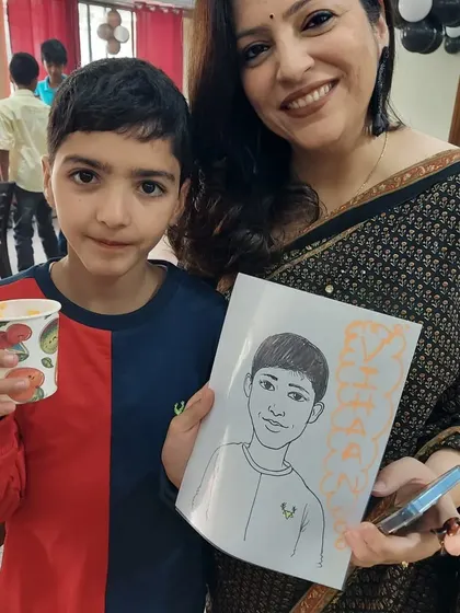 A mother and son enjoying the party activities together. Seeing our clients and their guests happy and engaged is the ultimate sign of a successful event.