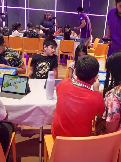 A duplicate of ID 205, this image captures the focused and collaborative atmosphere of our summer camp classroom.