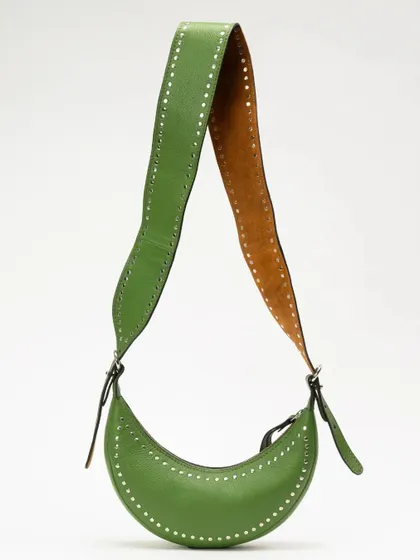 The Selena Studded in Jade, a vibrant green leather shoulder bag. The line of hand-applied studs follows the crescent shape, adding a subtle edge to the design.