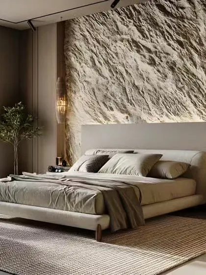 I used a textured stone accent wall in this bedroom to bring a natural, rugged element indoors, creating a unique and calming retreat.