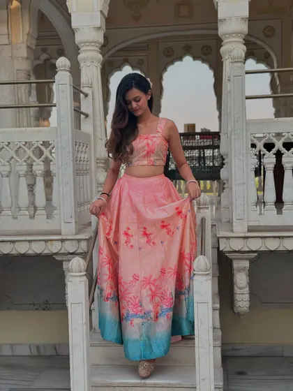 A photoshoot in a beautiful palace-like setting. The right location and outfit can make you feel like royalty, which is the vibe I aim for in my sangeet choreography.
