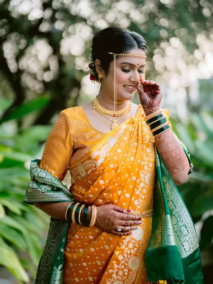 A candid and emotional portrait of the bride, Mansi, on her wedding day.