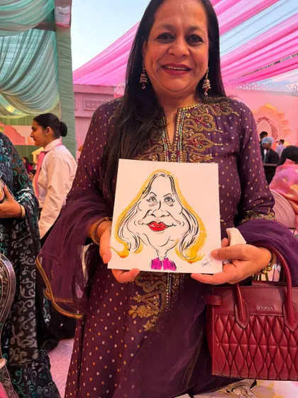 A guest at a wedding reception, looking elegant with her equally vibrant caricature.