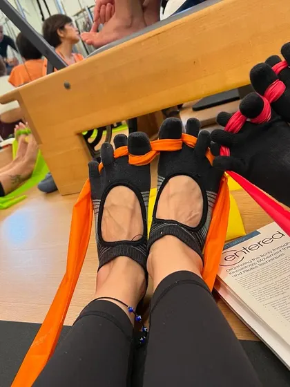 It's all in the details. This photo from a workshop shows our focus on the small, precise movements, like foot and ankle work, that create a huge impact on overall body mechanics.