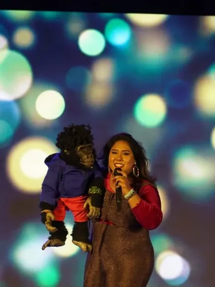 A candid moment of happiness during a performance. This is the genuine joy we bring to every event we host.