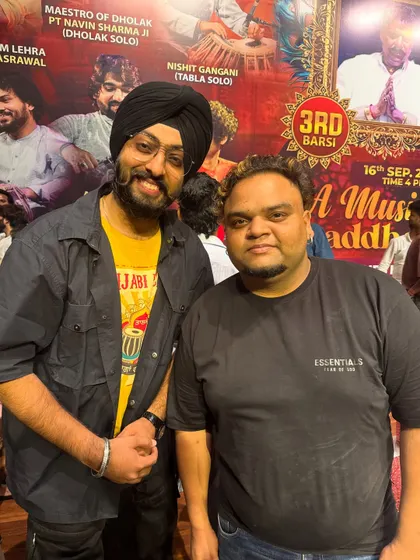 Another picture from a memorable music festival, sharing a frame with a fellow artist.