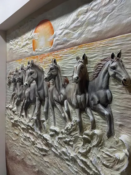 Another perspective of the dark horse mural, capturing the line of horses as they gallop across the wall.