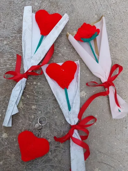 A collection of my Valentine's Day orders, featuring heart bouquets, rose bouquets, and heart keychains. Love is in the handmade details!