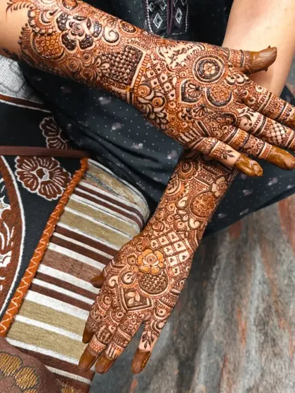 A half hands design with a focus on geometric patterns and intricate fills. The design is bold and beautiful.