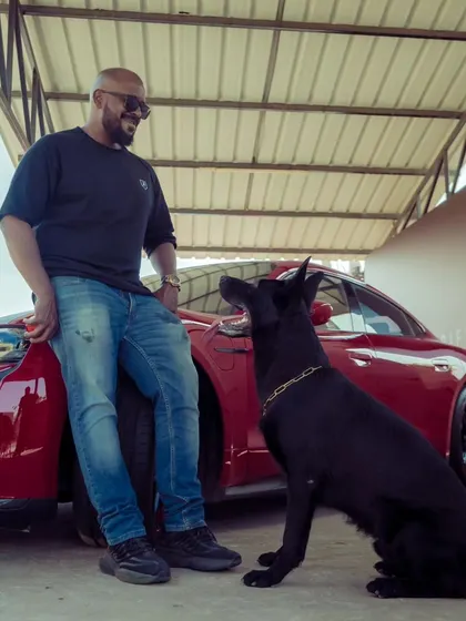 A moment of connection between me and my German Shepherd during a photoshoot. Our bond is the foundation of all our work.