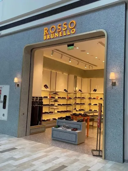 A wider angle of the Rosso Brunello store in Lucknow, showing its location within the mall.