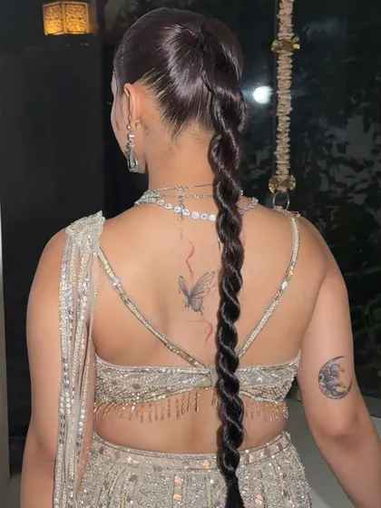 The beauty of a twisted braid is in its clean lines and glossy finish. This rear view shows the perfect symmetry and hold we achieve.
