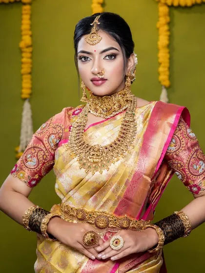 The way the jewellery sits against the rich silk saree is just perfect. This look is all about traditional elegance and celebrating our heritage.