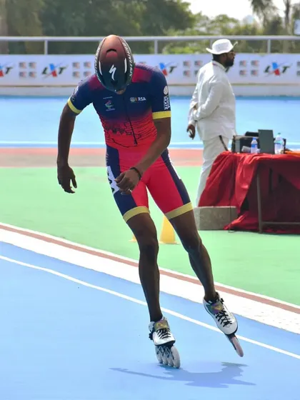 Speed and focus personified. National skating champion Dhanush Babu during a race, showcasing the results of his rigorous training program.