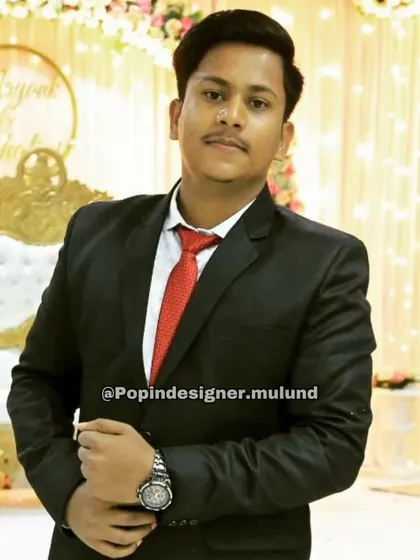 A classic black suit with a red tie is a look that never fails. This client looks sharp and ready for any formal occasion, from a wedding to a corporate event.