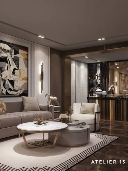 A formal living area designed around a large, vibrant art piece reminiscent of Picasso. The space includes a sophisticated bar in the background, demonstrating our ability to integrate art and entertainment into a cohesive luxury design.