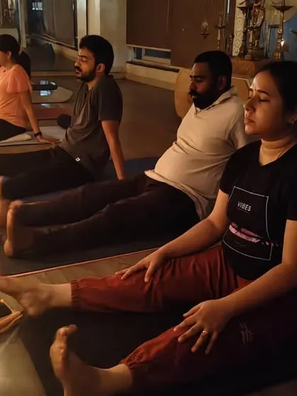 Students prepare for Tratak Kriya. This practice not only improves focus but also calms the nervous system and enhances inner awareness.