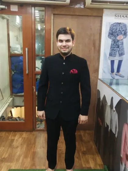 The classic black Jodhpuri suit, also known as a bandhgala, is a staple of men's formal wear. We tailor this timeless piece with premium fabric to ensure a sharp silhouette and a fit that is guaranteed.